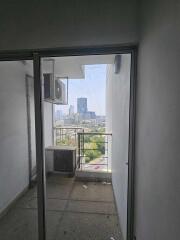 View of a balcony with a cityscape backdrop