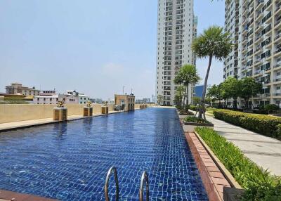 rooftop pool with view of cityscape