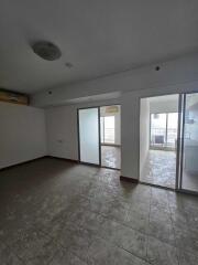 Spacious living room with sliding glass doors