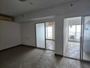 Spacious living room with sliding glass doors