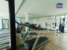 Fitness center with exercise equipment including treadmills and weight machines