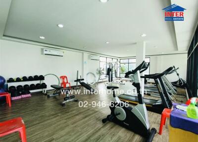 Modern fitness room with exercise equipment