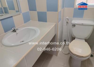 Bathroom with sink and toilet