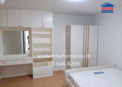 Bedroom with furniture and storage