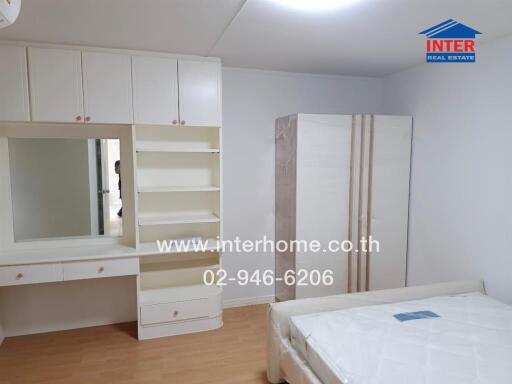 Bedroom with furniture and storage