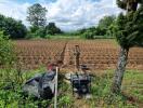 Cultivated field with irrigation equipment