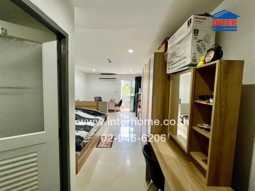 Modern bedroom with desk and storage units