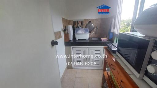 Compact kitchen area with basic amenities