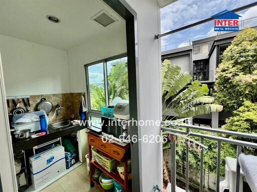 Small kitchen area with outdoor view