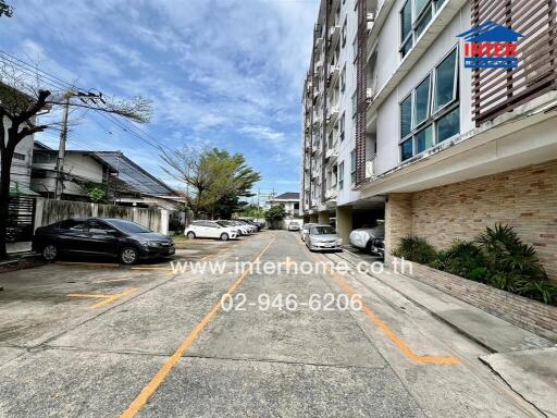 Condominium building exterior and parking area