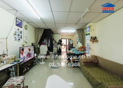 Living space with seating area and TV