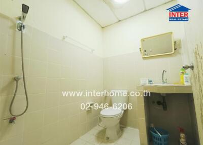 Bathroom with shower, toilet and sink