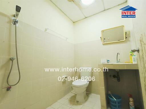 Bathroom with shower, toilet and sink