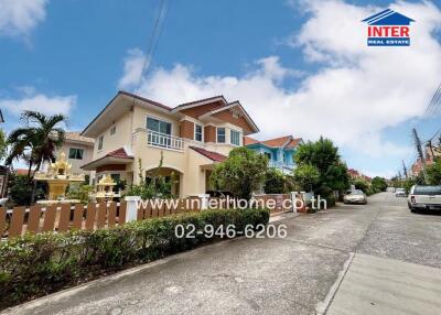 Street view of the front exterior of a residential house