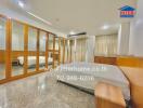 Spacious bedroom with large mirrored wardrobe and double bed