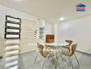 Dining area with modern chairs and glass table