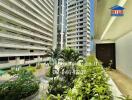 Exterior view of apartment buildings with greenery