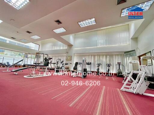 Spacious indoor gym with modern equipment