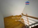 Wooden staircase with handrail