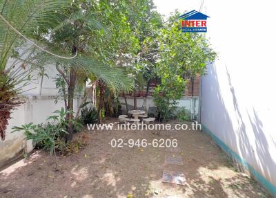 Outdoor garden space with seating area