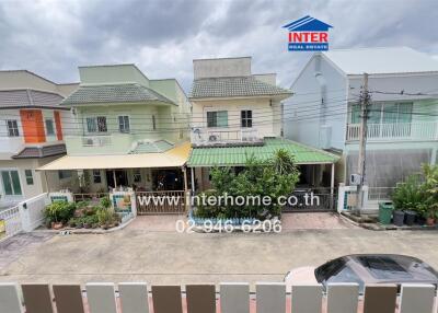 Exterior of townhouses with multiple homes in view