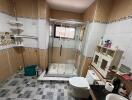 bathroom with shower and toilet