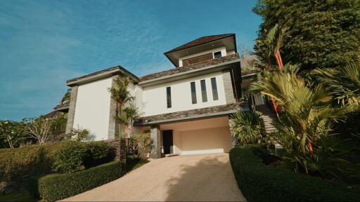 Exterior view of the house with garden