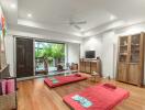 Spacious living room with hardwood floors and minimalist decor