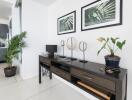 Modern living room with plant decor and a console table