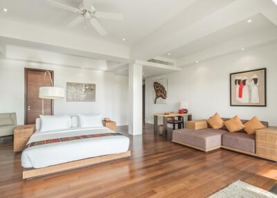 Spacious bedroom with adjacent seating area