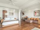 Spacious bedroom with adjacent seating area