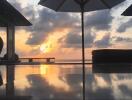 Scenic outdoor patio with ocean view at sunset