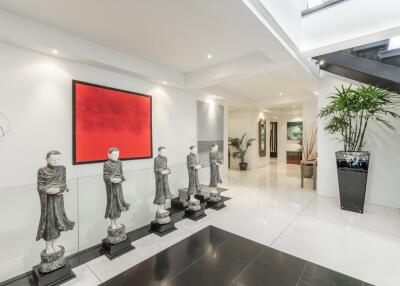 Modern lobby area with statues and art