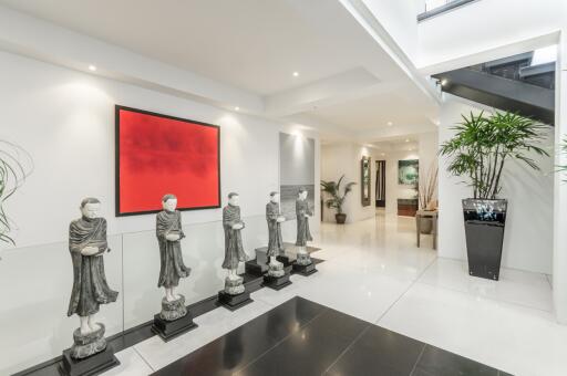 Modern lobby area with statues and art