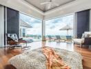 Spacious living area with a view of the outdoor patio and pool