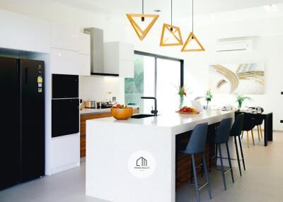 Modern kitchen with island and dining area