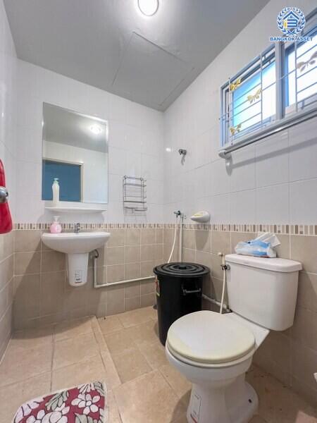 Modern, clean bathroom with sink and toilet