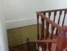 Wooden stairs with banister