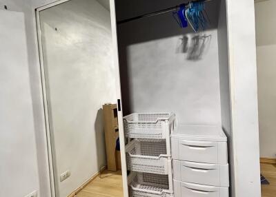 Bedroom closet with mirrored sliding doors