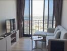 Modern living room with large window and city view