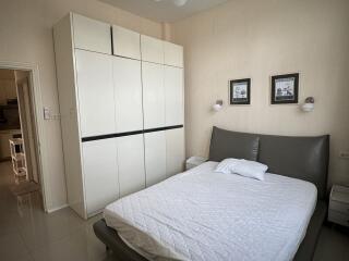 Modern bedroom with a double bed and wardrobe