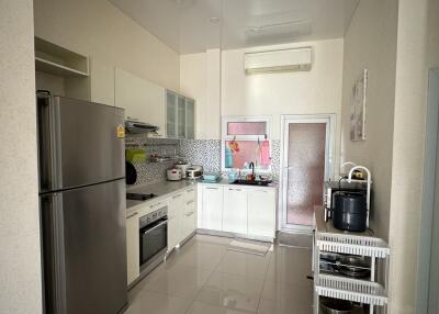 Modern kitchen with stainless steel appliances and ample counter space