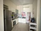 Modern kitchen with stainless steel appliances and ample counter space