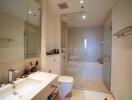 Modern bathroom with large mirror and bathtub