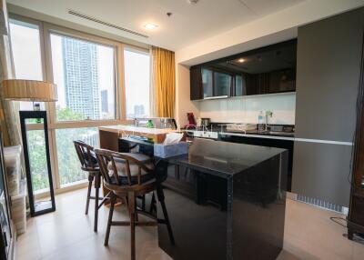 Modern kitchen with breakfast bar and city view