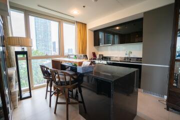 Modern kitchen with breakfast bar and city view