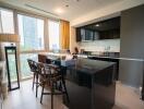 Modern kitchen with breakfast bar and city view