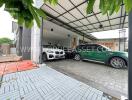 Covered garage with several parked cars