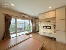 Modern living room with built-in storage and large windows