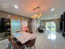 Modern living room with dining area and large windows